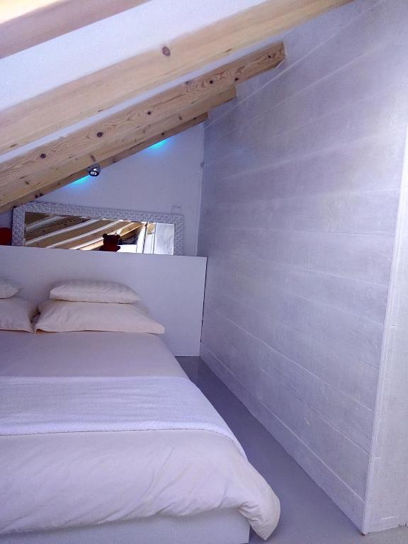 Posteľ alebo postele v izbe v ubytovaní Kike Apartment