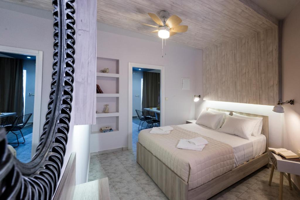 Postel nebo postele na pokoji v ubytování NK Apartments
