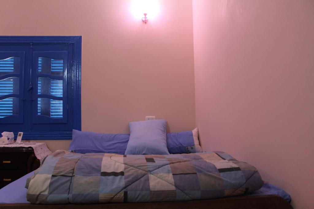 Postel nebo postele na pokoji v ubytování Tunis Village Chalet