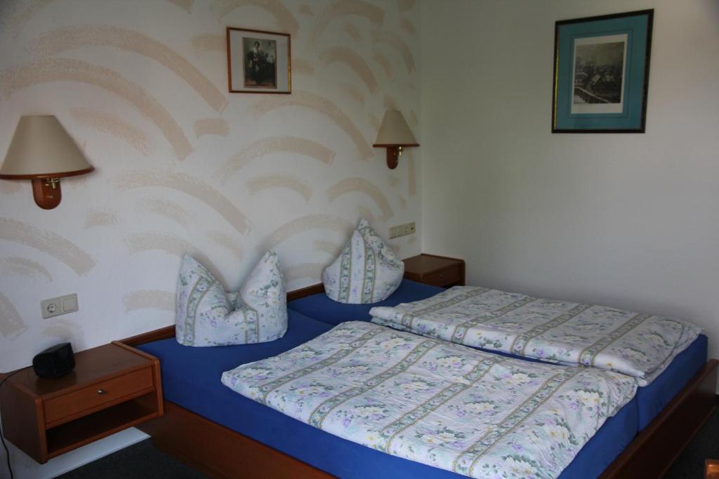 Postel nebo postele na pokoji v ubytování Wehrstedter Hof