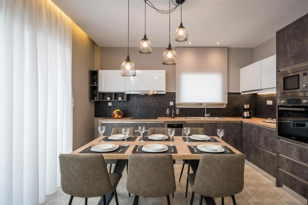 Kuchyň nebo kuchyňský kout v ubytování Mirma Luxury Apartment