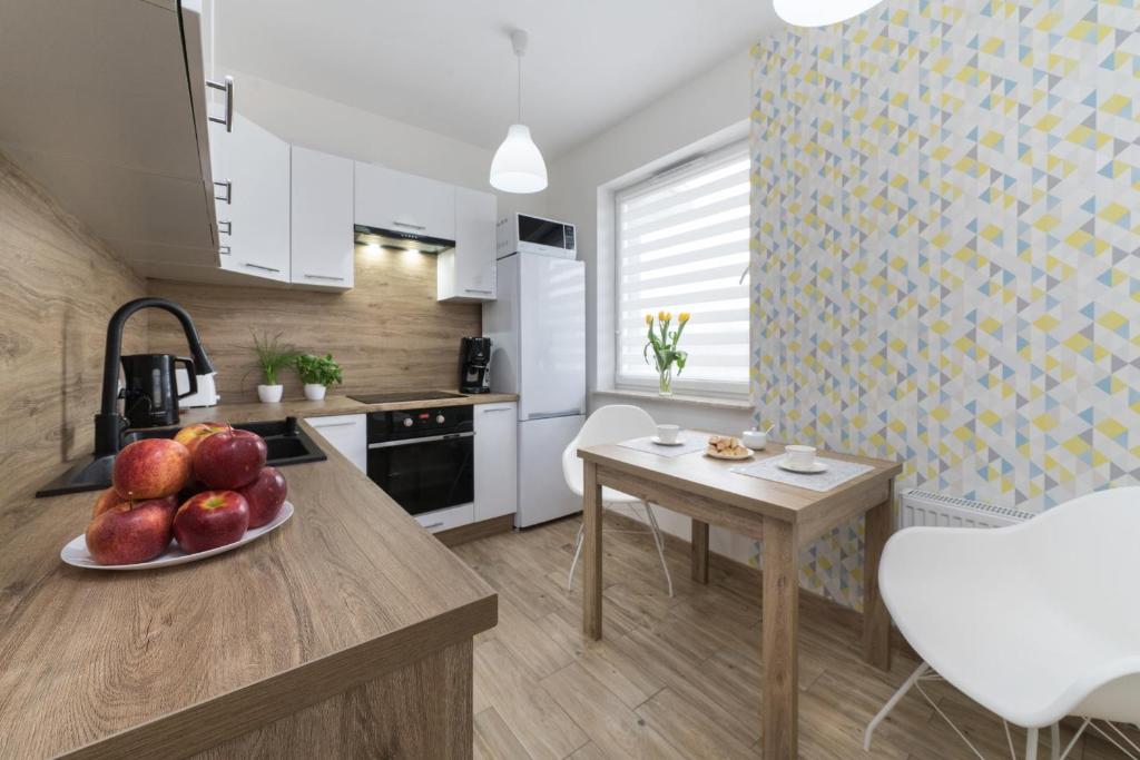 Kuchyňa alebo kuchynka v ubytovaní Apartament Sweet House