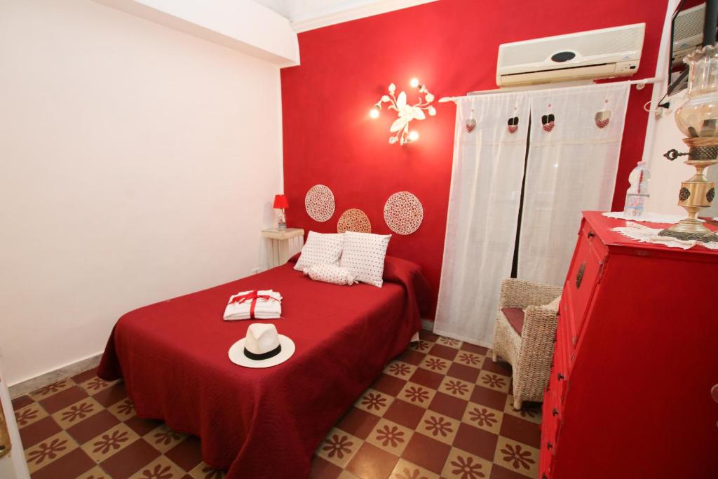 A bed or beds in a room at La Zagara B&B