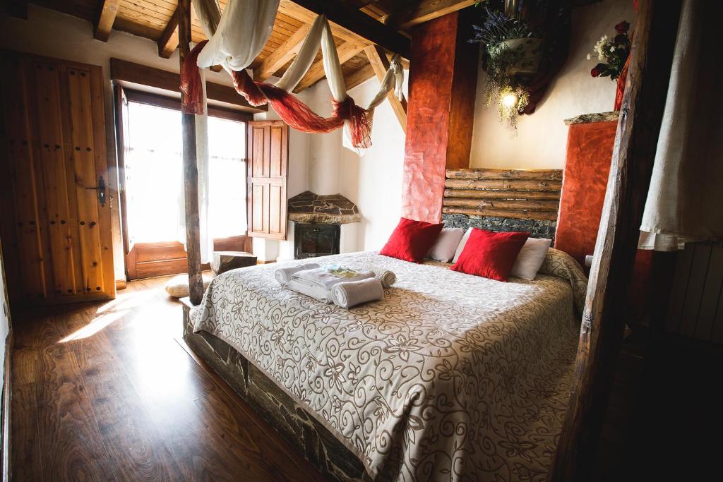 Postel nebo postele na pokoji v ubytování Orgullo Rural