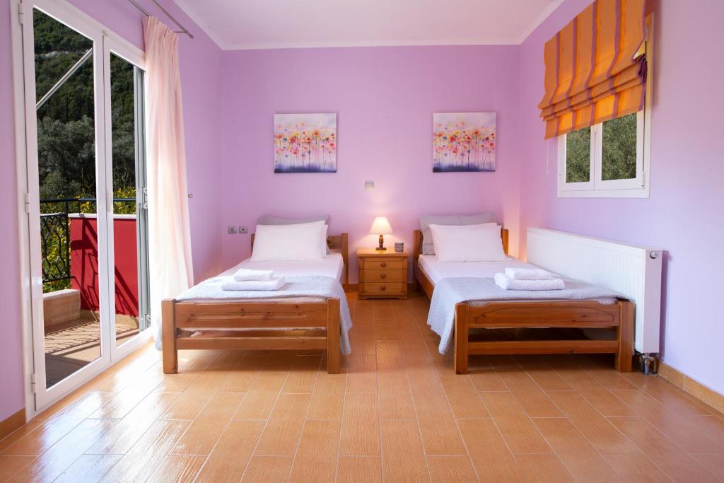 Posteľ alebo postele v izbe v ubytovaní Red Villa