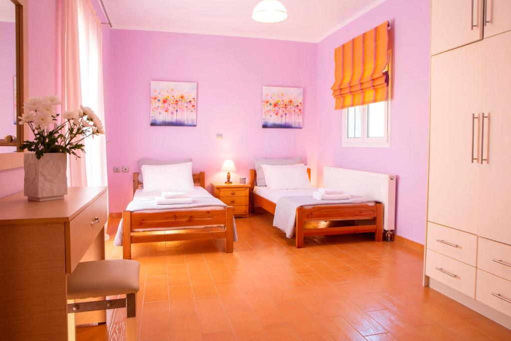 Posteľ alebo postele v izbe v ubytovaní Red Villa