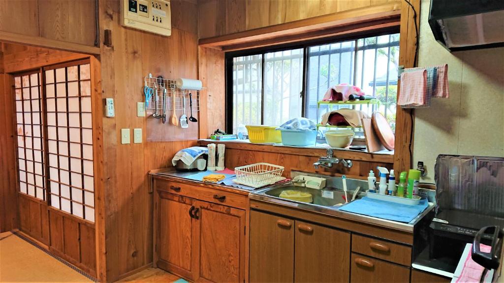 Kuchyň nebo kuchyňský kout v ubytování Cottage Yakusugi House