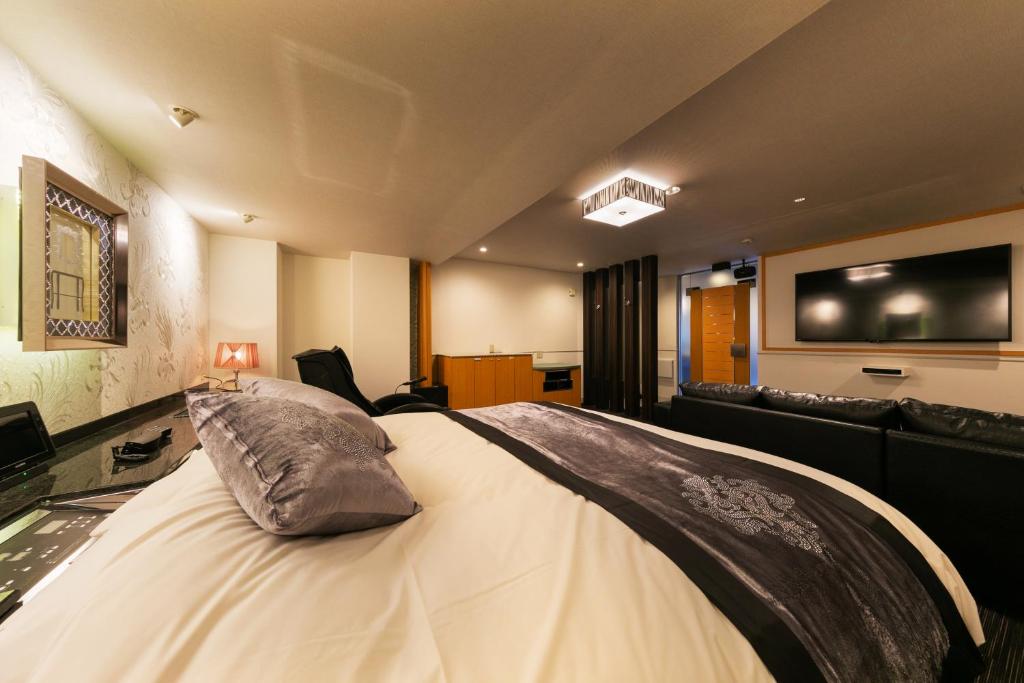 TV a/nebo společenská místnost v ubytování Hotel Eldia Modern Kobe(Adult Only)
