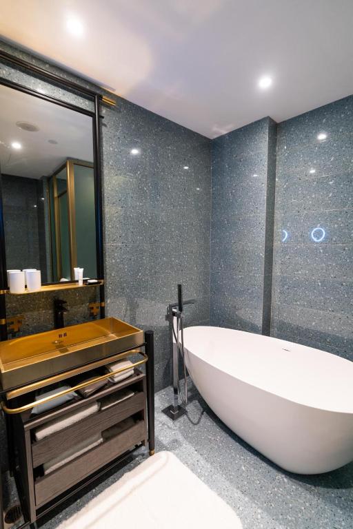 Koupelna v ubytování Hangzhou Cosy Park Hotel(Liangzhu)