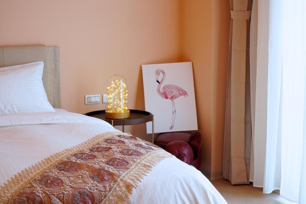 Postel nebo postele na pokoji v ubytování Little Piggy B&B