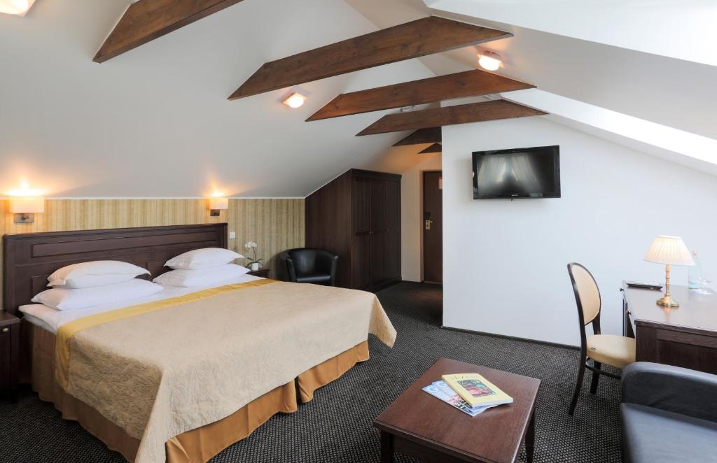 Voodi või voodid majutusasutuse The von Stackelberg Hotel Tallinn toas