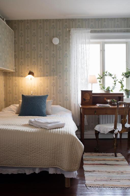 Postel nebo postele na pokoji v ubytování Strandvillan Hotell och Bed & Breakfast
