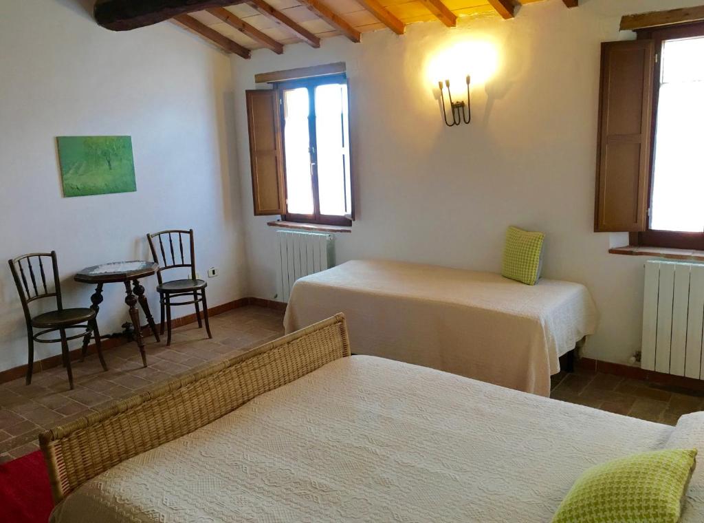 Postel nebo postele na pokoji v ubytování Casa Cernano