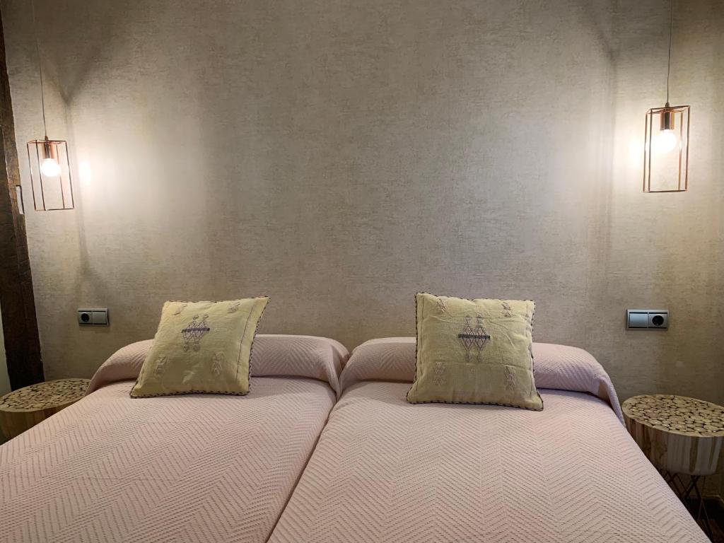 Posteľ alebo postele v izbe v ubytovaní Hostal El Resbalon