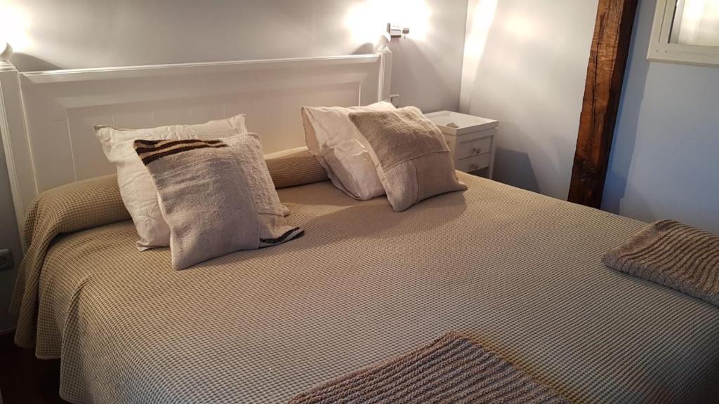 Posteľ alebo postele v izbe v ubytovaní Hostal El Resbalon