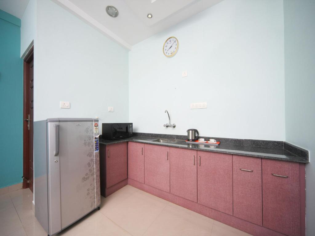 Kuchyň nebo kuchyňský kout v ubytování Max Classic Serviced Apartment