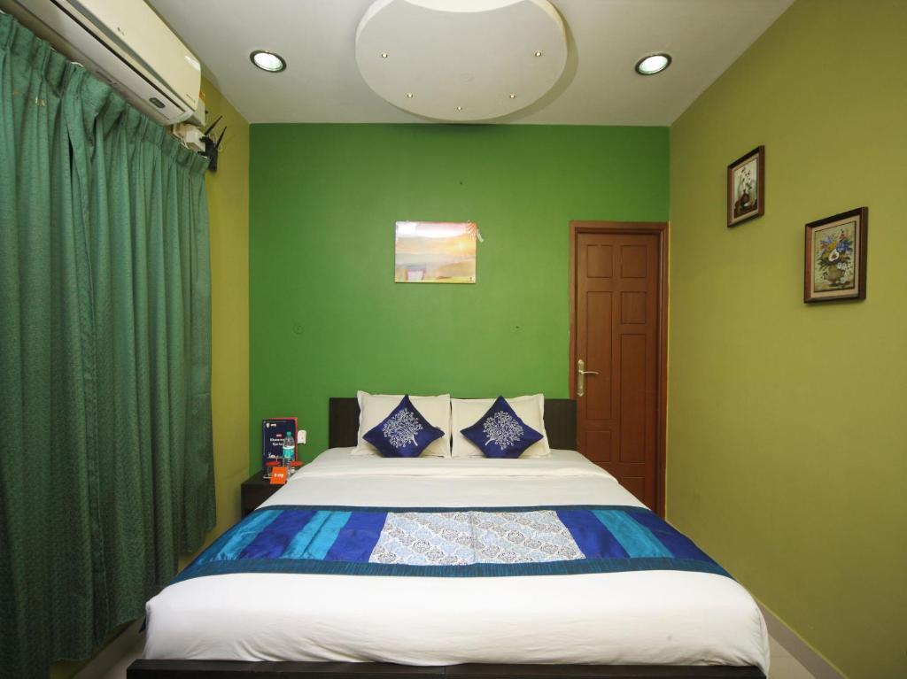 Postel nebo postele na pokoji v ubytování Max Classic Serviced Apartment