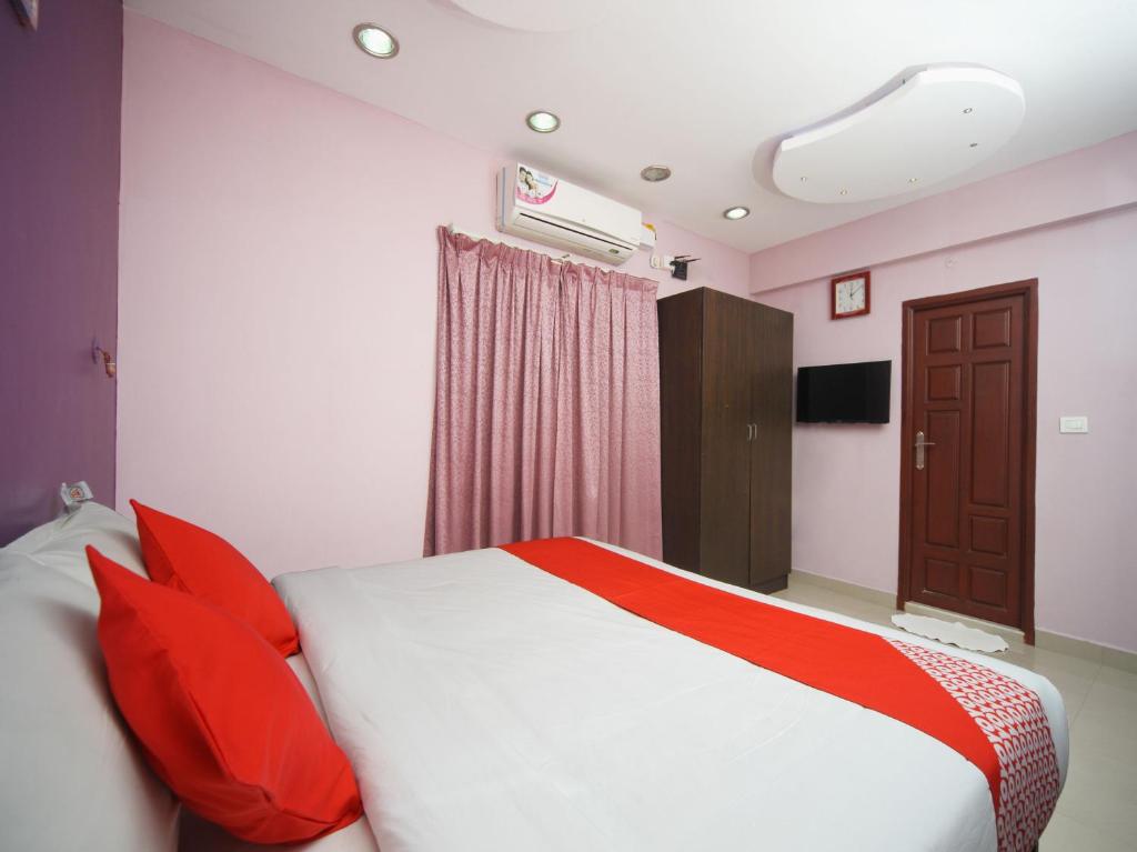 Postel nebo postele na pokoji v ubytování Max Classic Serviced Apartment