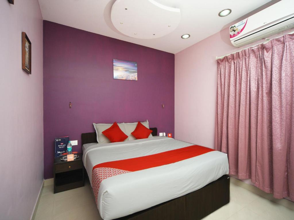 Postel nebo postele na pokoji v ubytování Max Classic Serviced Apartment
