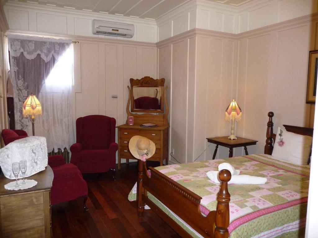 Postel nebo postele na pokoji v ubytování Hôtel-Auberge la Grande Maison et Spa