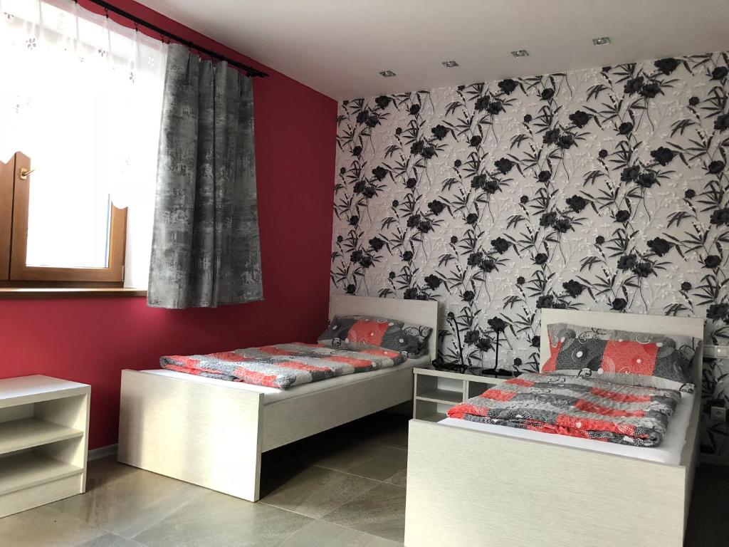 Postel nebo postele na pokoji v ubytování Hotel Harmonia