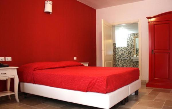 Postel nebo postele na pokoji v ubytování B&B Margherita