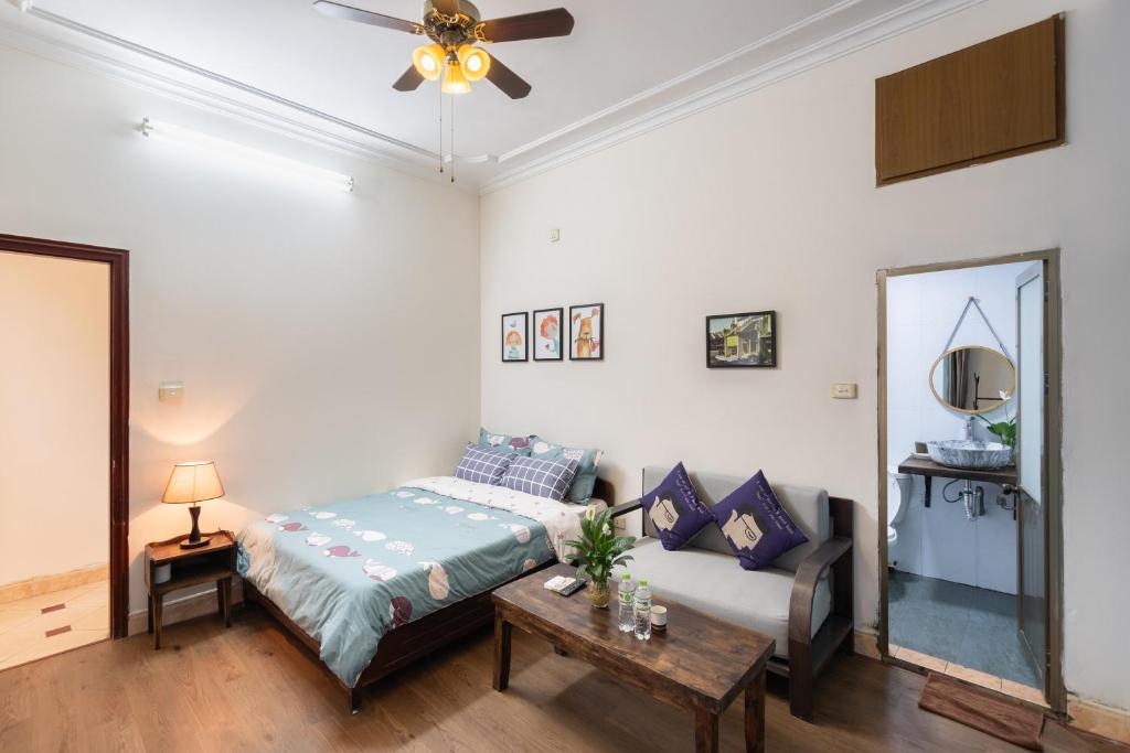 Postel nebo postele na pokoji v ubytování Hanoi Crocus Homestay