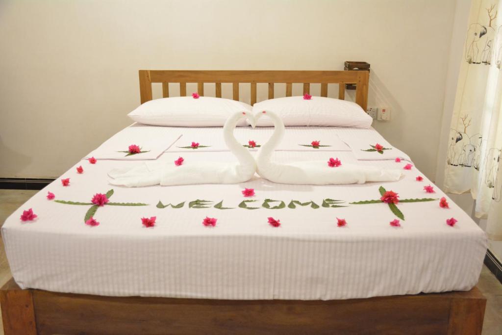 Postel nebo postele na pokoji v ubytování Jaye Eco Lodge