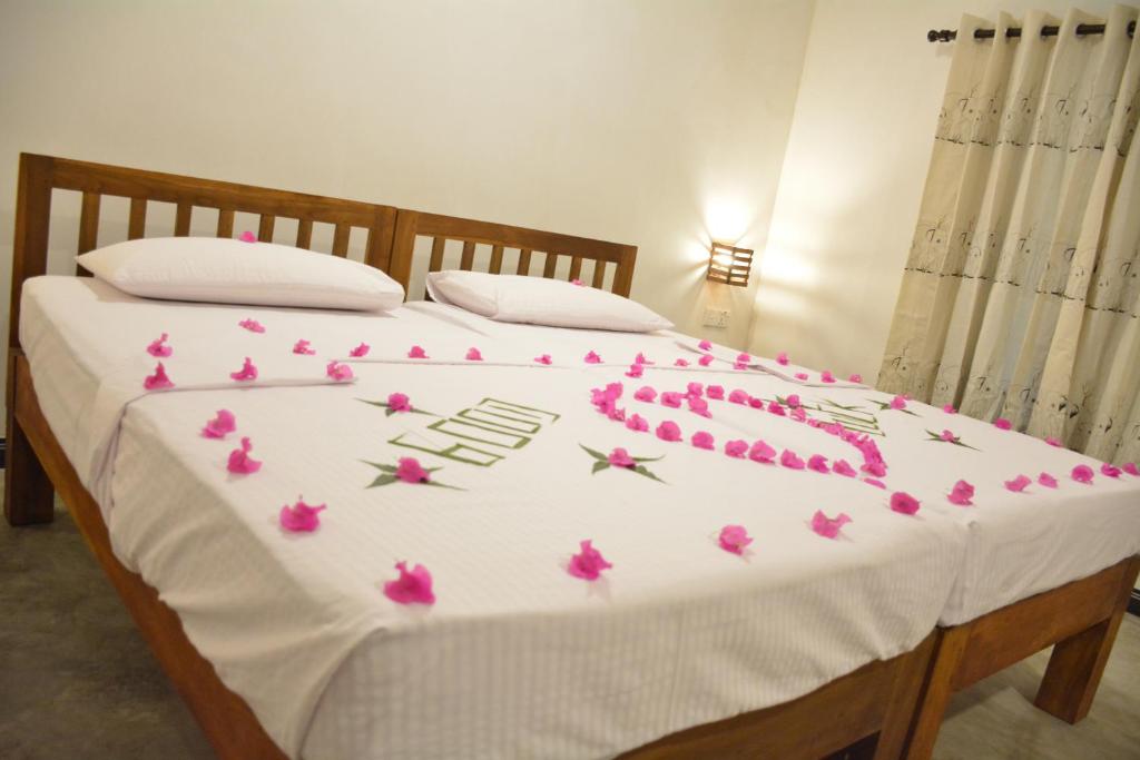 Postel nebo postele na pokoji v ubytování Jaye Eco Lodge