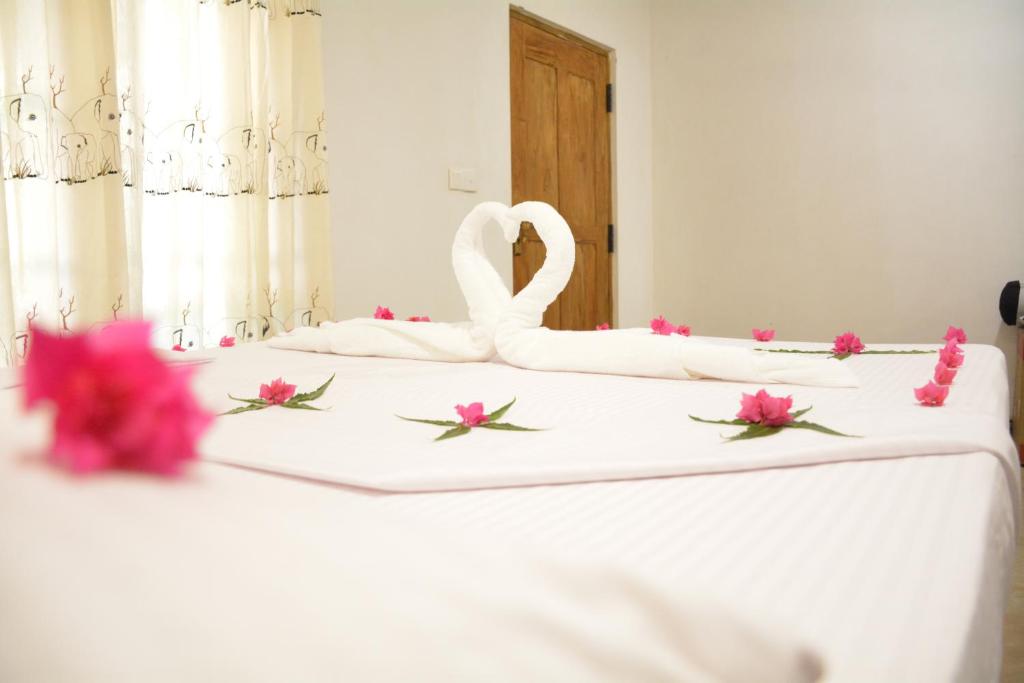 Postel nebo postele na pokoji v ubytování Jaye Eco Lodge