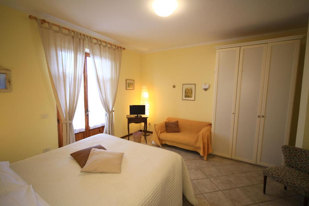 Postel nebo postele na pokoji v ubytování Casa Milena