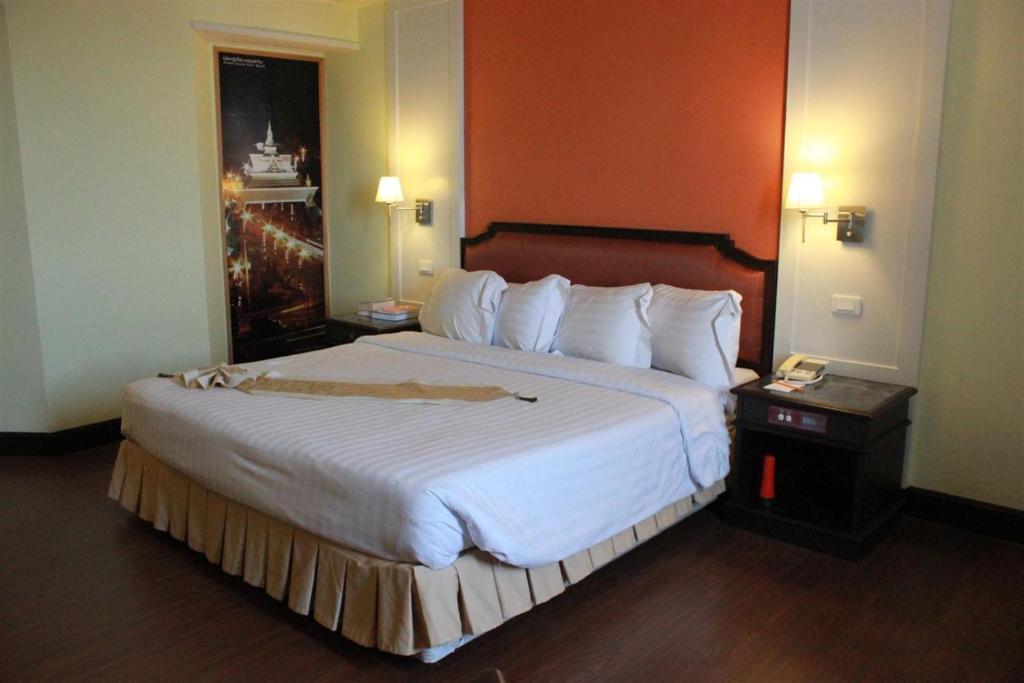 Postel nebo postele na pokoji v ubytování Charoen Thani Hotel, Khon Kaen