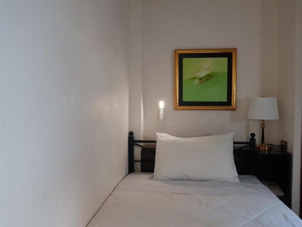 Postel nebo postele na pokoji v ubytování Memory Hotel