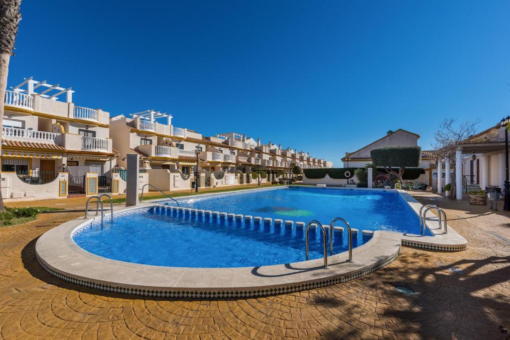 Bazén v ubytovaní PENTHOUSE CABO ROIG - ALDEAS I alebo v jeho blízkosti
