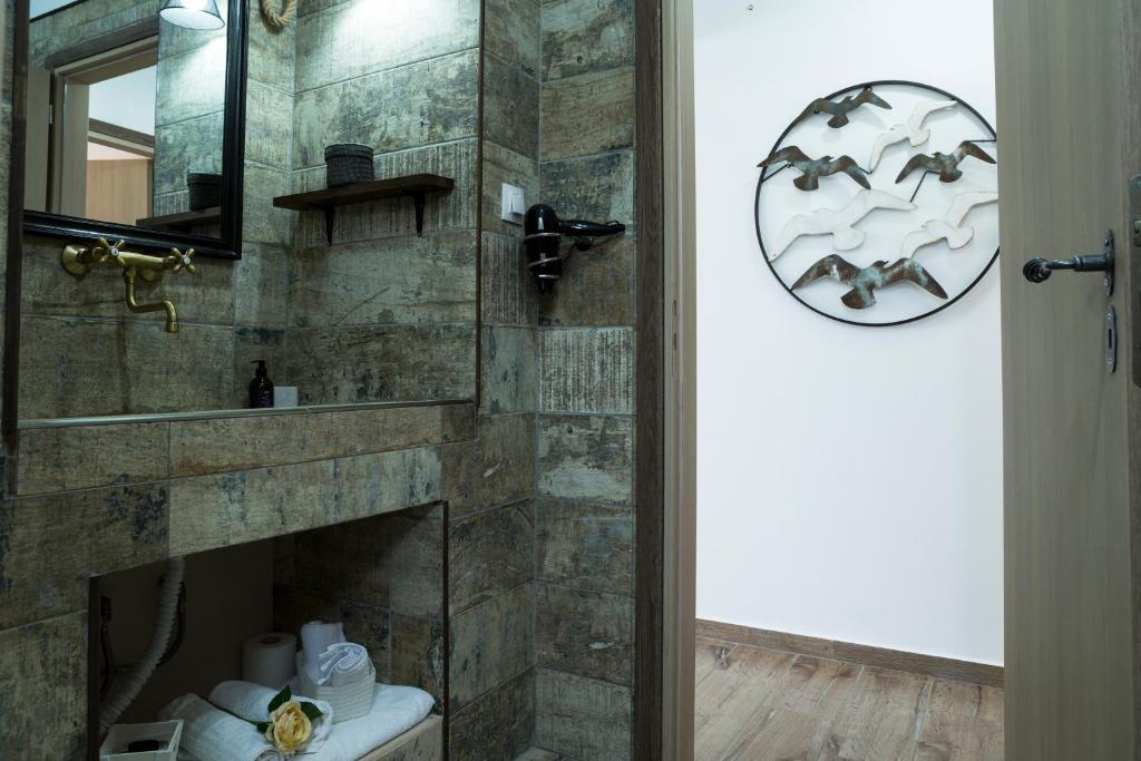 Koupelna v ubytování EvaEle Luxury Apartments