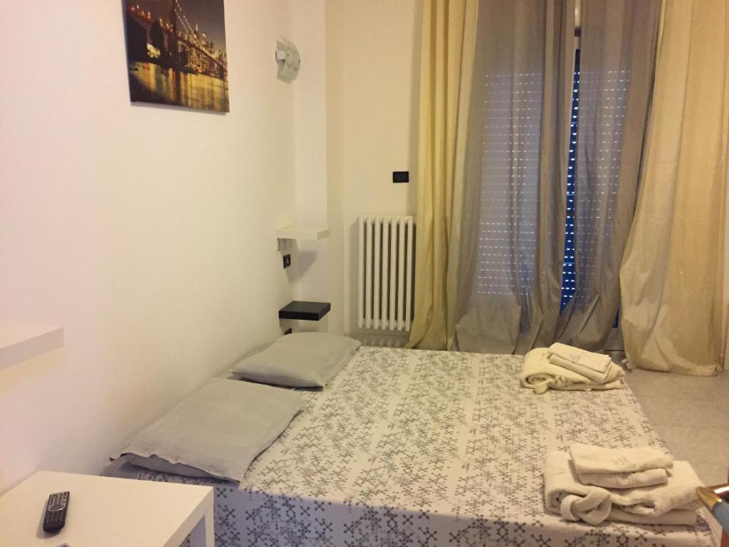 Postel nebo postele na pokoji v ubytování Albergo Lamanna Hotel digitale