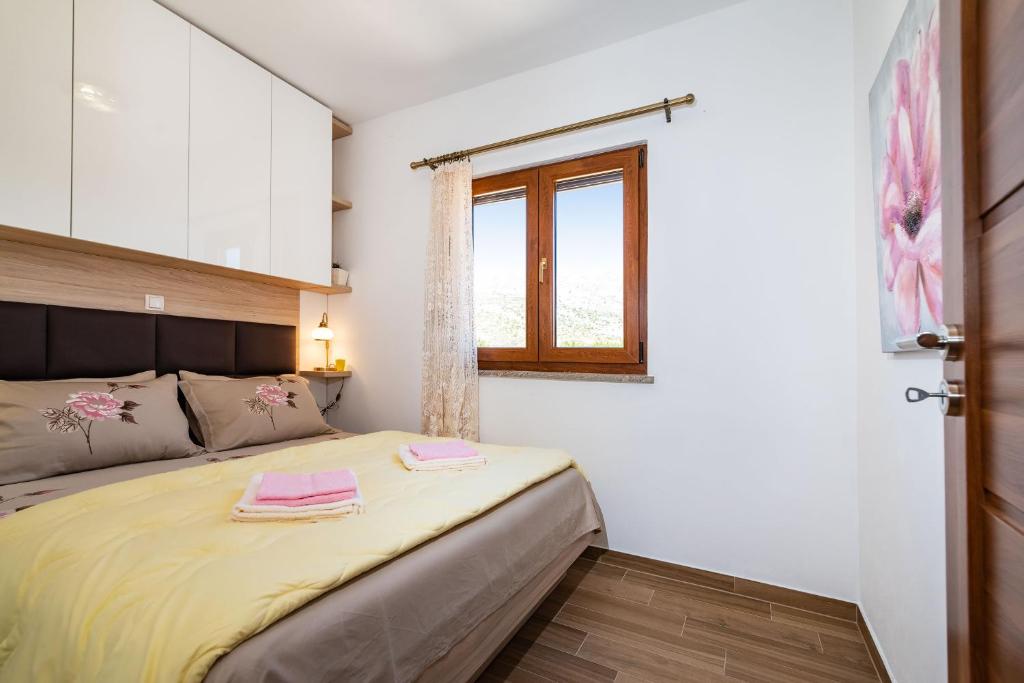 Posteľ alebo postele v izbe v ubytovaní Holiday Home Lota