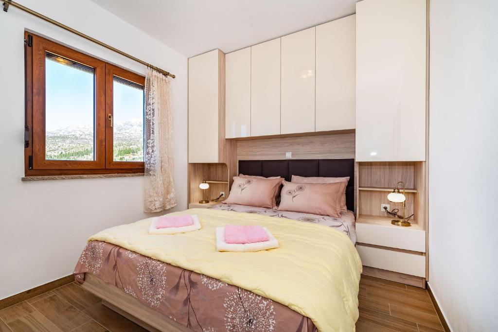 Posteľ alebo postele v izbe v ubytovaní Holiday Home Lota