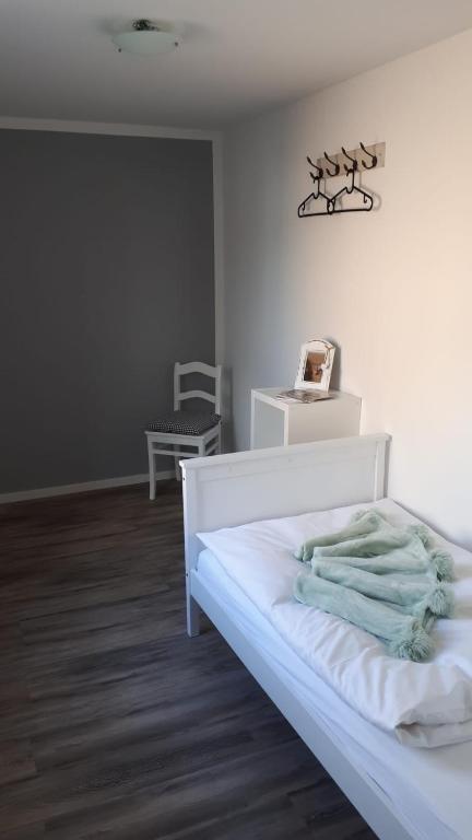 Postel nebo postele na pokoji v ubytování Guest House Dommitzsch