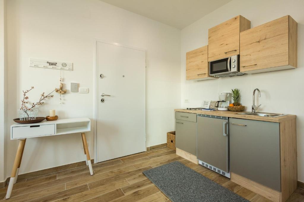 Kuchyňa alebo kuchynka v ubytovaní 2Bfree Apartments