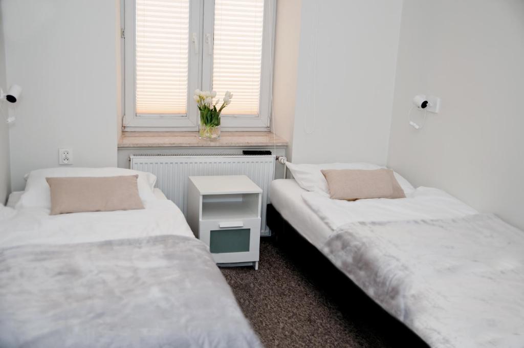 Postel nebo postele na pokoji v ubytování Rodmos Hostel