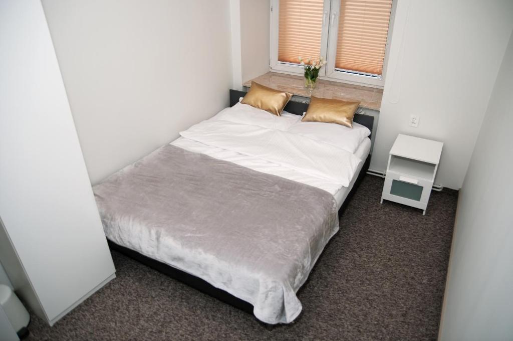 Postel nebo postele na pokoji v ubytování Rodmos Hostel