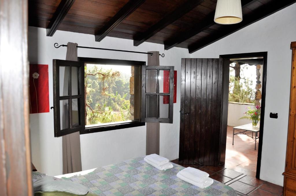 Postel nebo postele na pokoji v ubytování Monte frio de Tenerife
