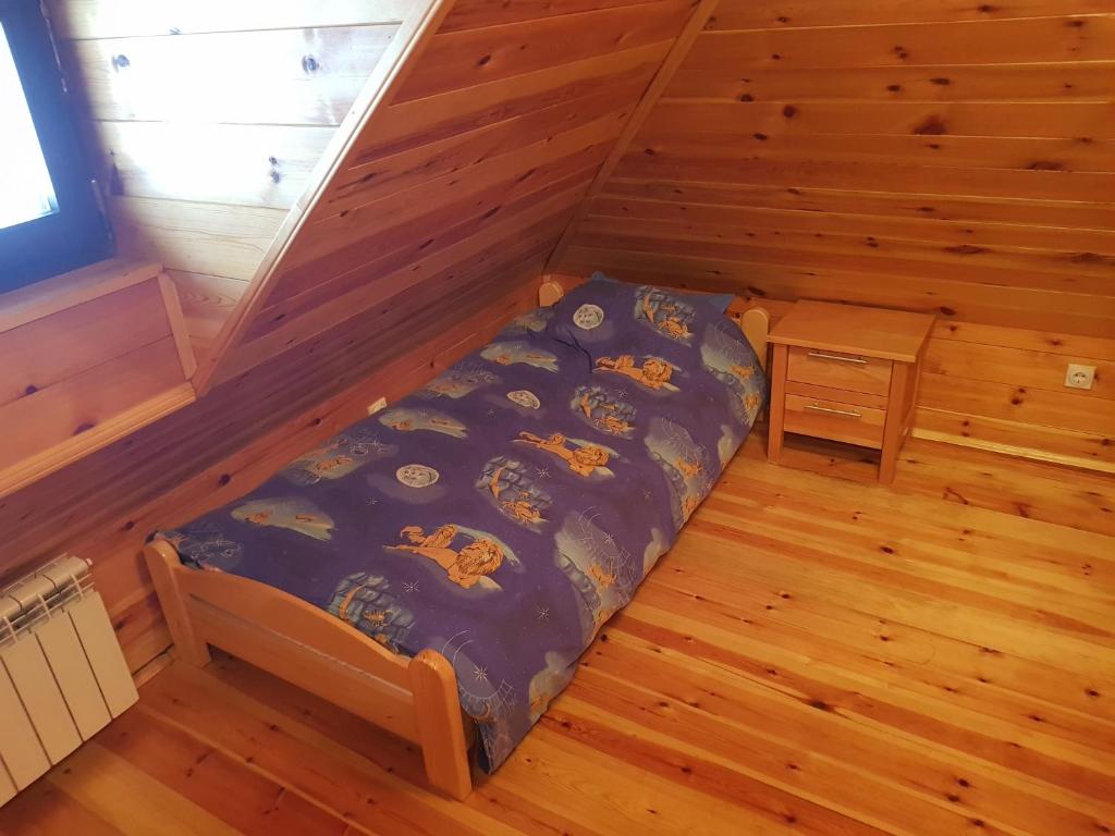 Postel nebo postele na pokoji v ubytování Divcibarski Konak