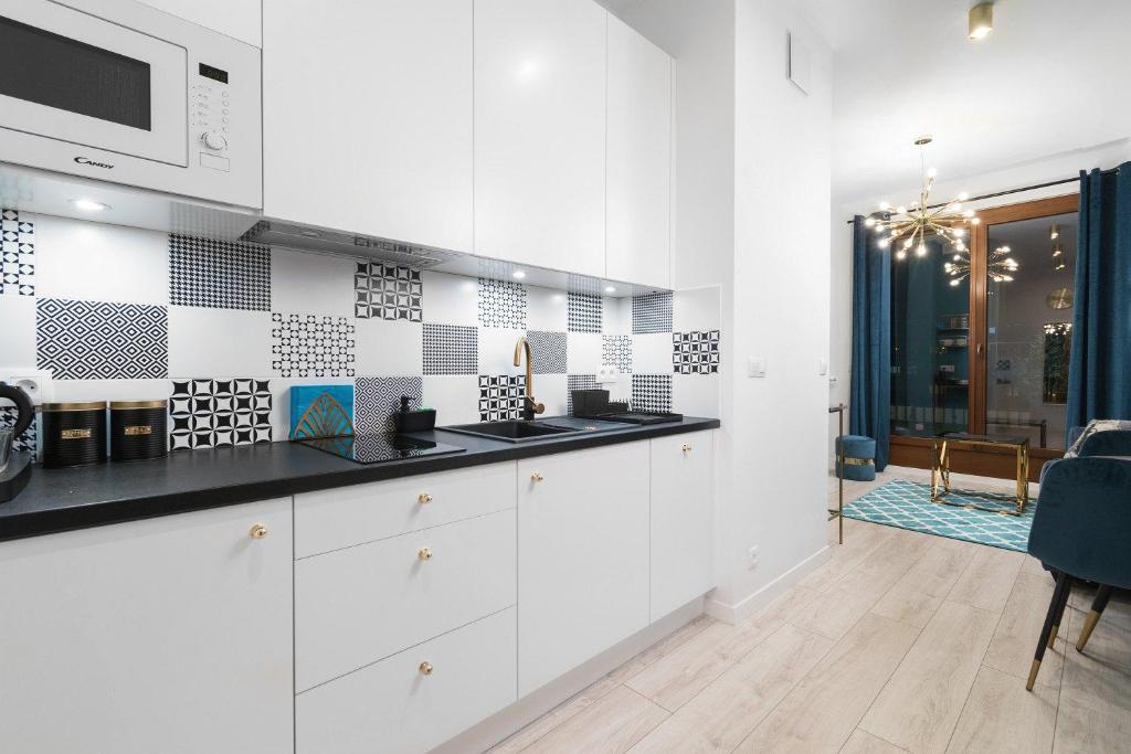 Kuchyňa alebo kuchynka v ubytovaní Prime Apartments