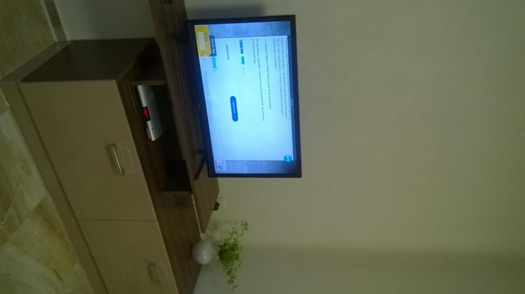 TV a/nebo společenská místnost v ubytování Apartamenti Zhelezovi