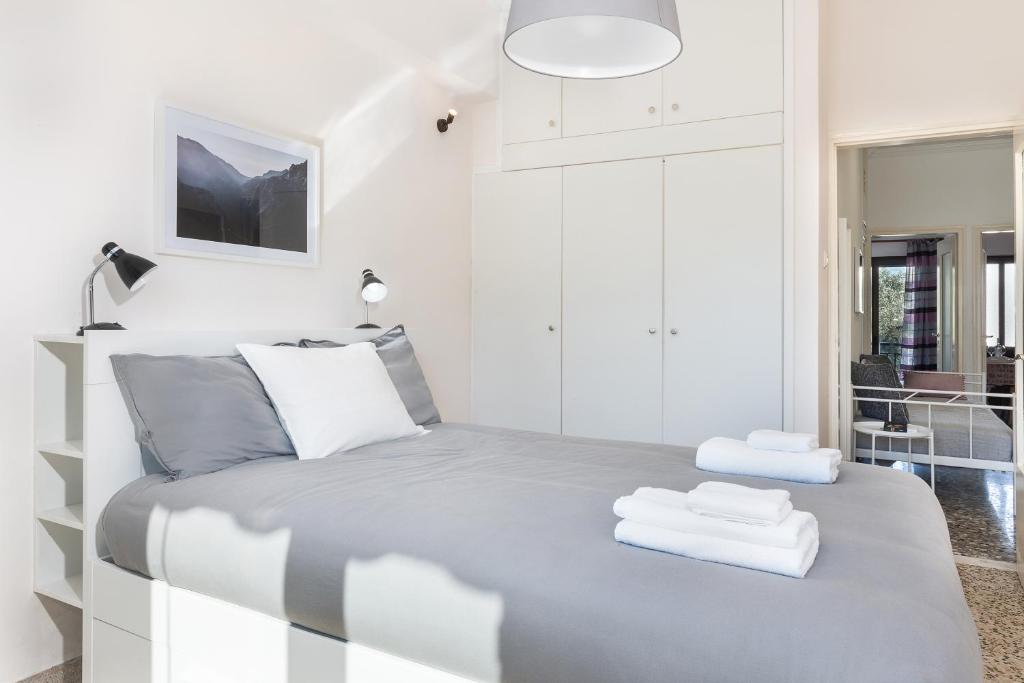 Łóżko lub łóżka w pokoju w obiekcie Mampochi Guesthouse