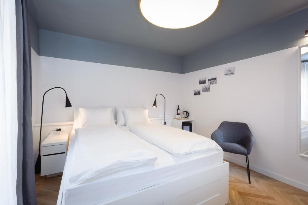 Postel nebo postele na pokoji v ubytování MK Luxury Rooms