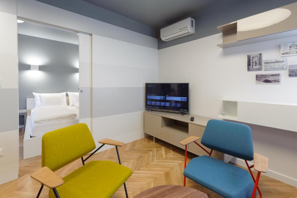 TV a/nebo společenská místnost v ubytování MK Luxury Rooms