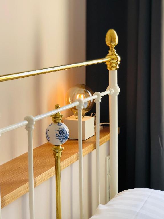 Postel nebo postele na pokoji v ubytování Hotel Alexander
